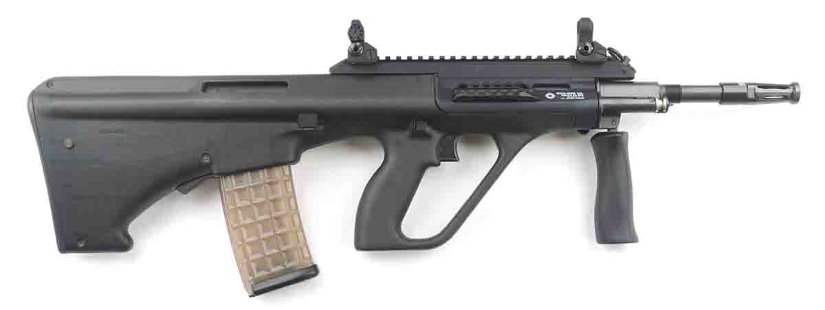 The recent AUG/A3 SA dispenses with a permanent optical sight in favor of several Picatinny rails that will accommodate a variety of riflescopes and standard battle sights.